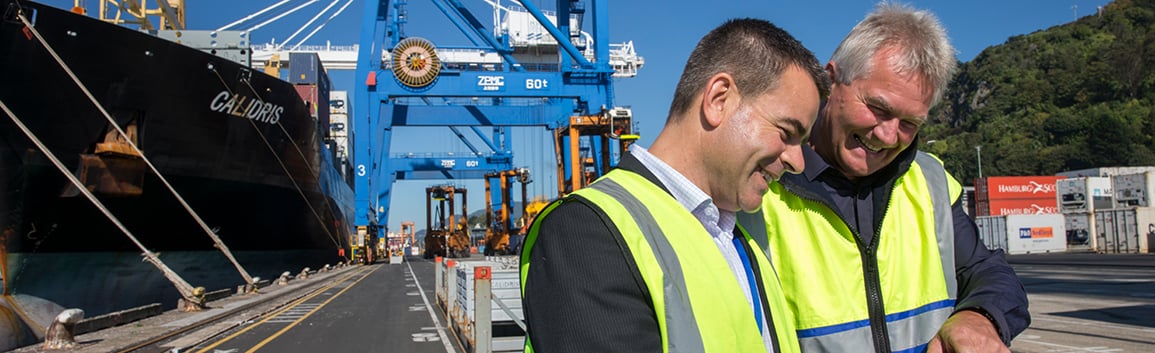 Two men in discussion at Port Otago terminal